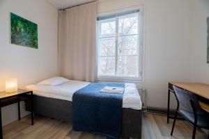 Keskusta sviitti parvekkeella ja pyykinpesukoneella Vanha Postitalo