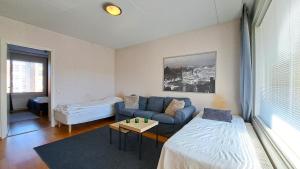 Kotimaailma Apartments - tilava saunallinen kaksio - Verstaankatu