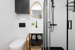 Cozy Apartment near Royal Baths Park by Noclegi Renters