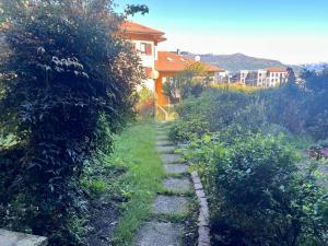 appartamento con giardino a 2 minuti dal lago