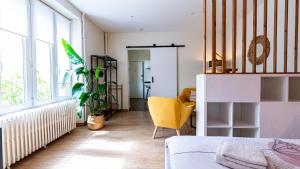 Appartements Le Nid - hebergement cosy : photos des chambres