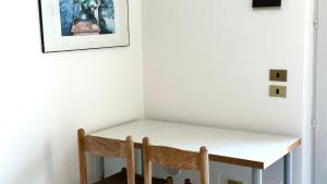 Palme 6 - Marcelli, bilocale con doppio giardino, Residence Le Palme