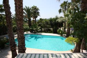 Villas Superbe Villa avec Piscine Palmier et vue : photos des chambres