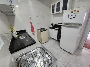 Frente ao mar e shopping La Plage, 2 quartos sacada , 1 vaga de garagem