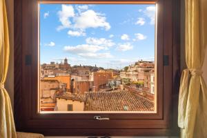 Piazza Mattei Terrace Apartment | Romeloft