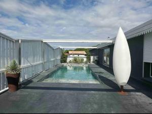 Appartements Roof top piscine chauffee 7 pers wifi : photos des chambres