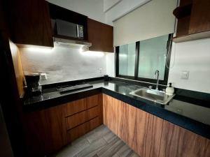 Estudio cerca de la playa y Alberca vista al mar