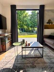 Vrijstaande 6 persoons Bungalow hottub en pizzaoven op vakantiepark