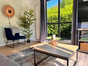 Vrijstaande 6 persoons Bungalow hottub en pizzaoven op vakantiepark