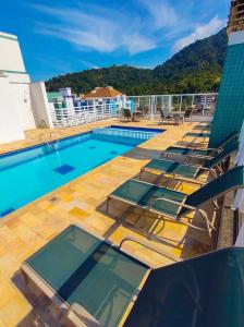 Apartamentos a 200m praia das Toninhas - Condomínio Vista Verde | Piscina na Cobertura com vista Espetacular