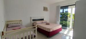 Casa Verde- MAR-Ac+650m Praia+WIFI+Suíte 2º andar