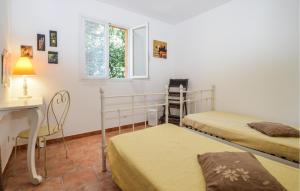 Maisons de vacances Cozy Home In Piscia Rossa With Wifi : photos des chambres