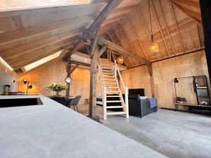 Wonen in een boerenschuur uit 1899