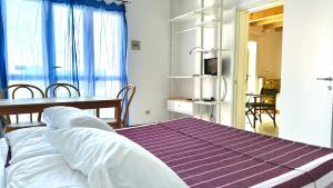 Palme 10 - Marcelli, bilocale con doppio giardino, Residence Le Palme