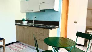 Palme 1C - Marcelli, monolocale con giardino, Residence Le Palme