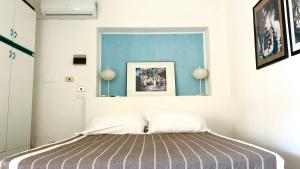 Palme 1C - Marcelli, monolocale con giardino, Residence Le Palme