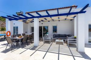 Villa Almyrida View by Villa Plus