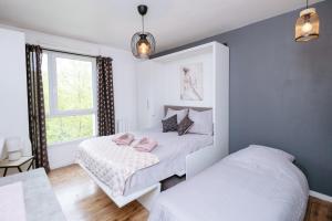 Appartements NeuvaRoom : photos des chambres