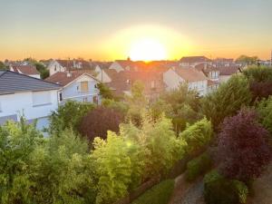 Appartements Sweet Home 1mn Train RER A et 10mn de Paris : photos des chambres