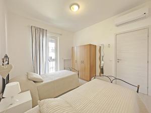 612 - Bellissimo trilocale nuovo a Marcelli, climatizzato con ampio giardino - SPIAGGIA WHITE BEACH CLUB INCLUSA