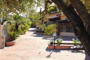 Two-Bedroom Apartment (4 Adults) room in Arbatax Le Terrazze sul Mare