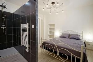 Appartements Carlota - Appartement renove au coeur de la vieille ville - by TGB : photos des chambres