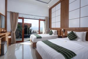 Phòng Hai Giường Đơn Loại Sang (Deluxe Twin Room)