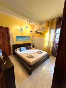 Trilocale sul mare con ampia veranda coperta