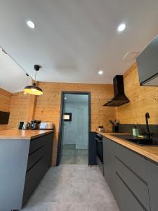 Les Chalets Perce Neige & Jacuzzi privatif, proximite Gerardmer & La Bresse : photos des chambres