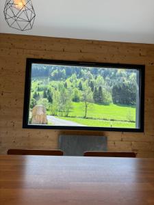 Les Chalets Perce Neige & Jacuzzi privatif, proximite Gerardmer & La Bresse : photos des chambres