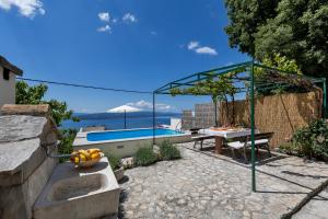 Holiday home Marta with heated pool,grill,sea view