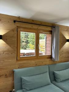 Chalets du Bouchot & Jacuzzi privatif proximite Gerardmer & La Bresse : photos des chambres
