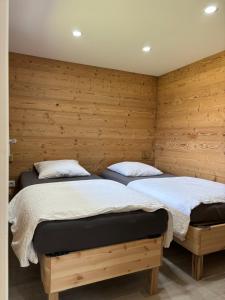 Chalets du Bouchot & Jacuzzi privatif proximite Gerardmer & La Bresse : photos des chambres