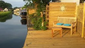 Chalet direkt an der Gracht mit eigenem Bootsanlegesteiger - Hauwert