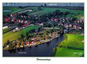 Chalet direkt an der Gracht mit eigenem Bootsanlegesteiger