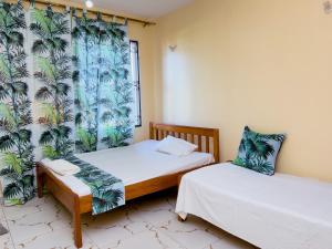 LN NYALI THREE BEDROOM FULLY FURNISHED APARTMENT WITH A SWIMMING POOl