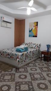 Casa espaçosa com Wi-Fi, garagem para 2 veículos e área externa em Campos dos Goytacazes