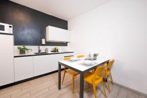 CityU Grazioli 27 Appartamento Trento Città - 2 stanze con 2 parcheggi privati gratuiti