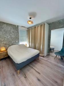 Appartements Le Rooftop : logement 3 etoiles : photos des chambres
