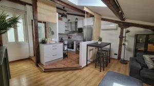 Buhardilla céntrica para parejas