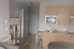 Studio voor 4 personen met zwembad aan zee
