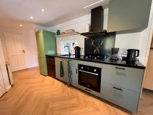 Kindvriendelijk sfeervol vakantiehuis Bosgeneugte bij zwembad op de Veluwe