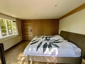 Kindvriendelijk sfeervol vakantiehuis Bosgeneugte bij zwembad op de Veluwe