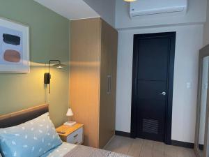 Elegant 1 BR Condo with Balcony in Uptown Parksuites II, BGC