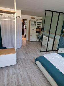 Sejours chez l'habitant Chambre proche circuit 24h : photos des chambres