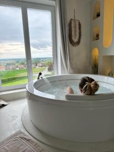 Appartements Chambre et spa privatif : photos des chambres