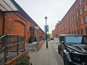 Apartament przy Loftach u Scheiblera parking podziemny, Śniadaniownia