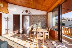 CALDERA close to the port, airport & Athens