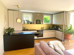 SONNENWEG Designwohnung mit Gartenblick