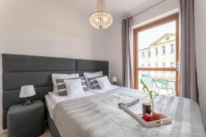 Apartamenty Bałtyckie - Grand Baltic - WIFI, Klimatyzacja, Sala Zabaw, Taras wypoczynkowy, centrum Ustki